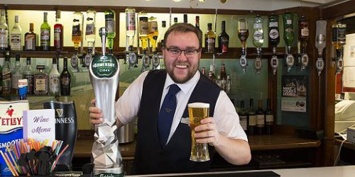 Barman-servering-drinks-at-hotel